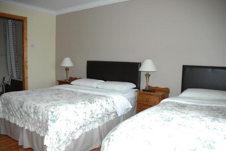 Postel nebo postele na pokoji v ubytování Quay House