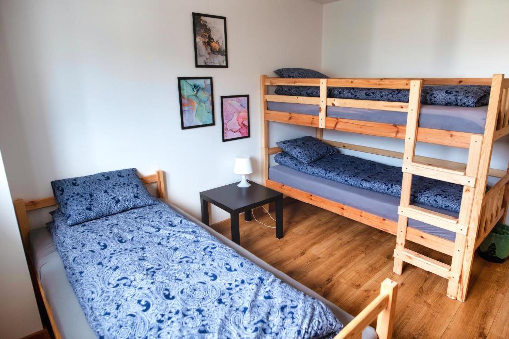 Voodi või voodid majutusasutuse Hotel NOCLEGI WRZOSOWA Siedlce toas