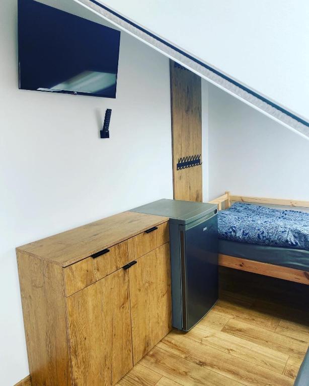 Voodi või voodid majutusasutuse Hotel NOCLEGI WRZOSOWA Siedlce toas