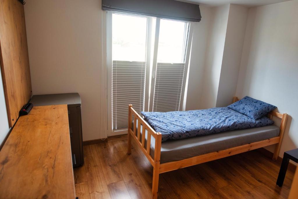 Voodi või voodid majutusasutuse Hotel NOCLEGI WRZOSOWA Siedlce toas
