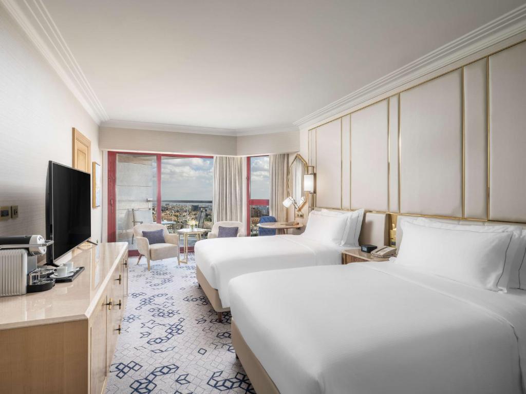 Postel nebo postele na pokoji v ubytování Jeddah Hilton