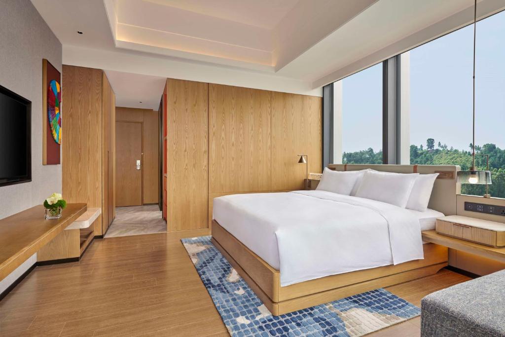 Postel nebo postele na pokoji v ubytování DoubleTree by Hilton Guangzhou Zengcheng