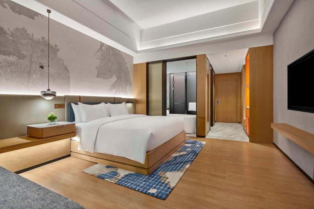 Postel nebo postele na pokoji v ubytování DoubleTree by Hilton Guangzhou Zengcheng