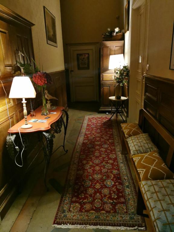 Posezení v ubytování Les chambres d'hôtes du Manoir de Roz-Maria