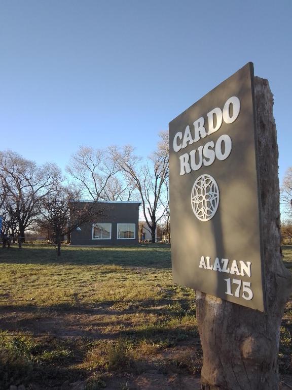 a sign for the carolina museum in a park at Cardo Ruso Cabaña in Toay