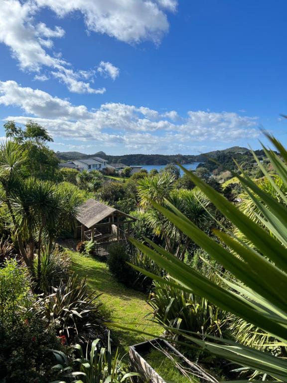 a view of the garden from the house at Tutukaka Sunrise in Tutukaka