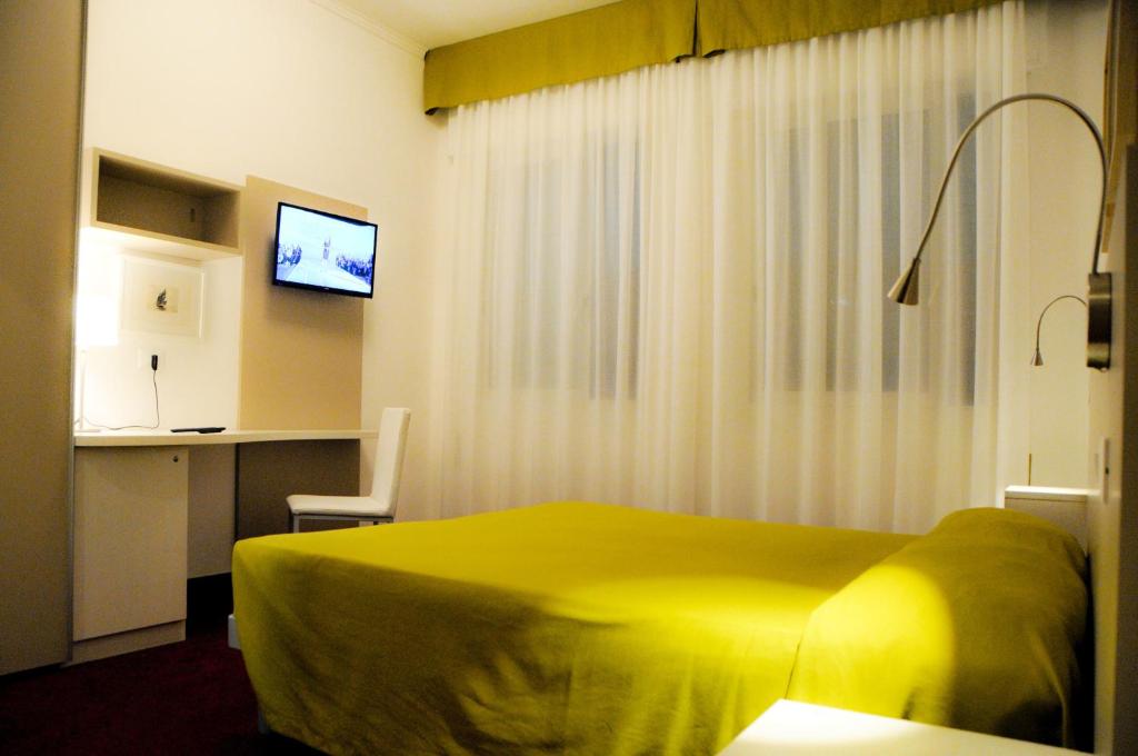 TV a/nebo společenská místnost v ubytování Hotel Da Mario
