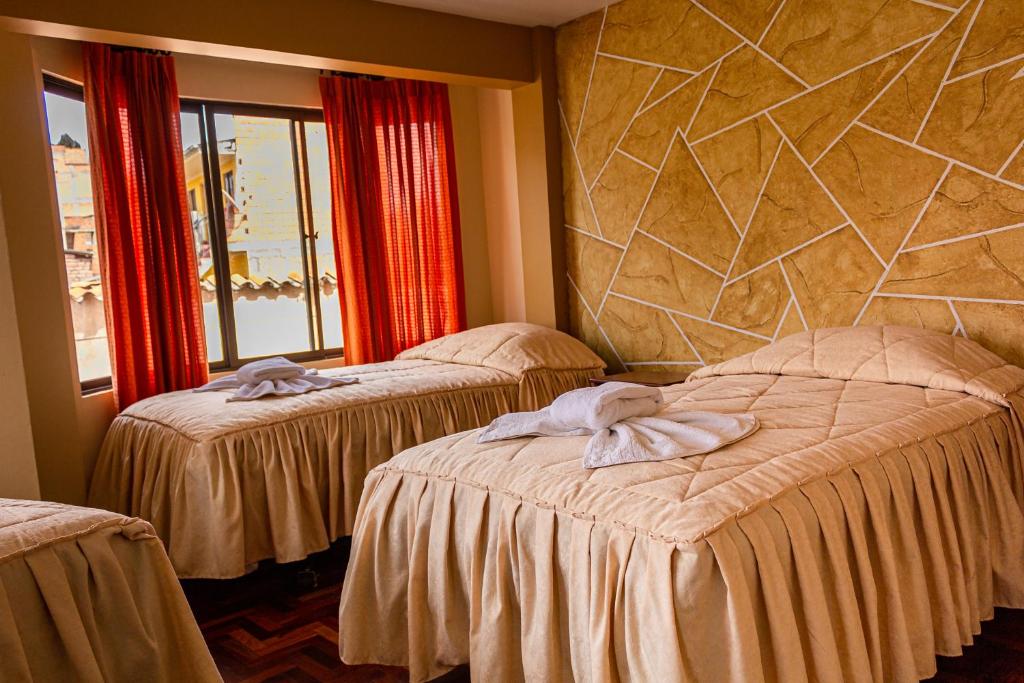 Ένα ή περισσότερα κρεβάτια σε δωμάτιο στο Hostal Sonia