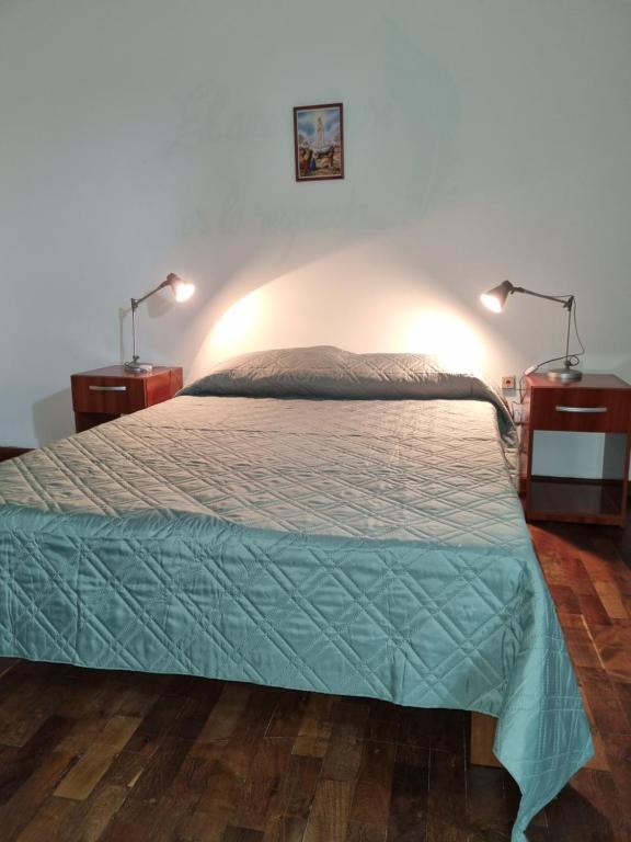 Ένα ή περισσότερα κρεβάτια σε δωμάτιο στο Casa Adelaida en Yerba Buena