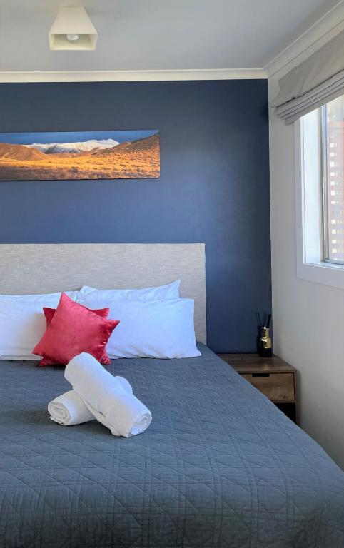 Postel nebo postele na pokoji v ubytování Colonial Motel