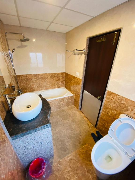 Koupelna v ubytování Hotel Abi International