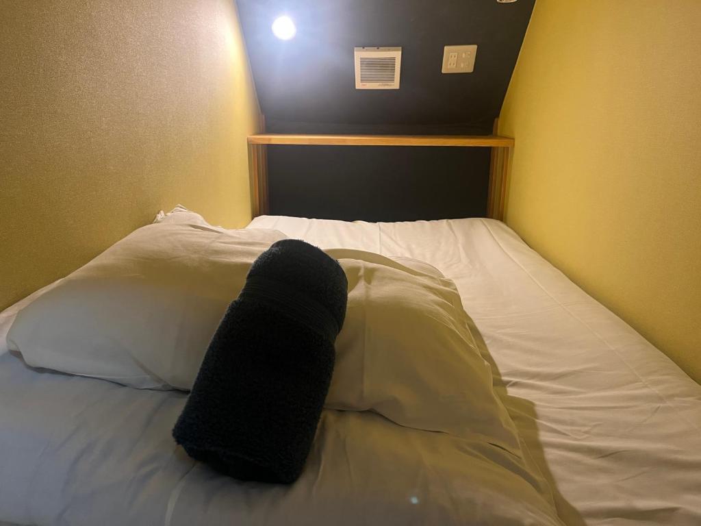 Postel nebo postele na pokoji v ubytování Hostel Mallika