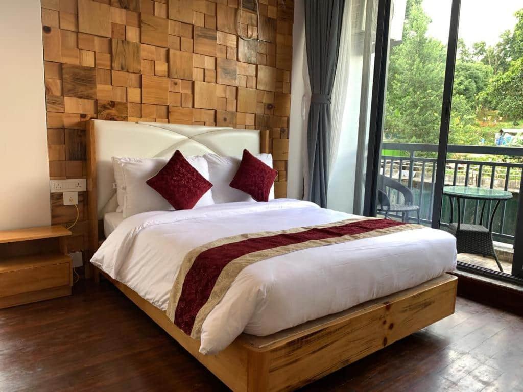 Voodi või voodid majutusasutuse Hotel Smarak toas