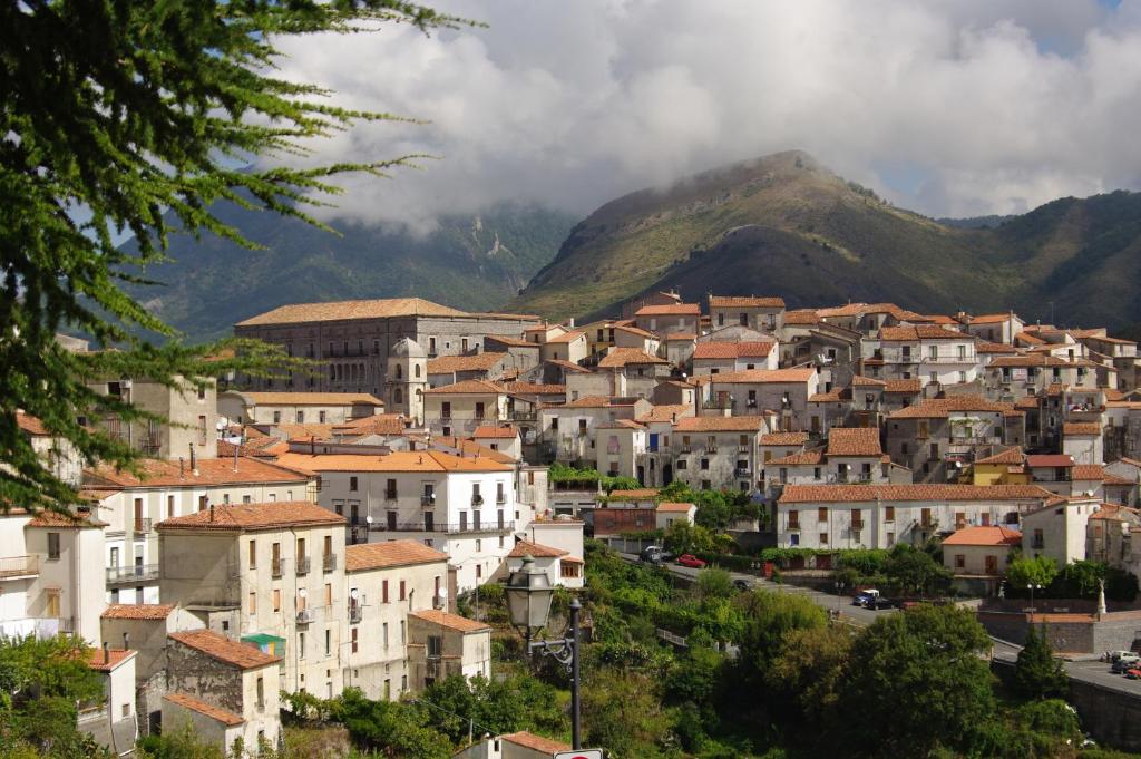 a town in front of a mountain at Le Due Lanterne in Aieta