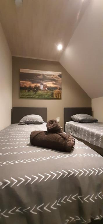 Säng eller sängar i ett rum på Vakantiewoning Victors Hof tot 4 pers