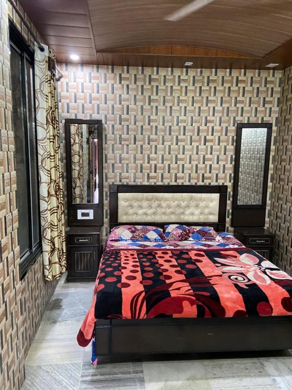 Postel nebo postele na pokoji v ubytování Hotel Tip Top