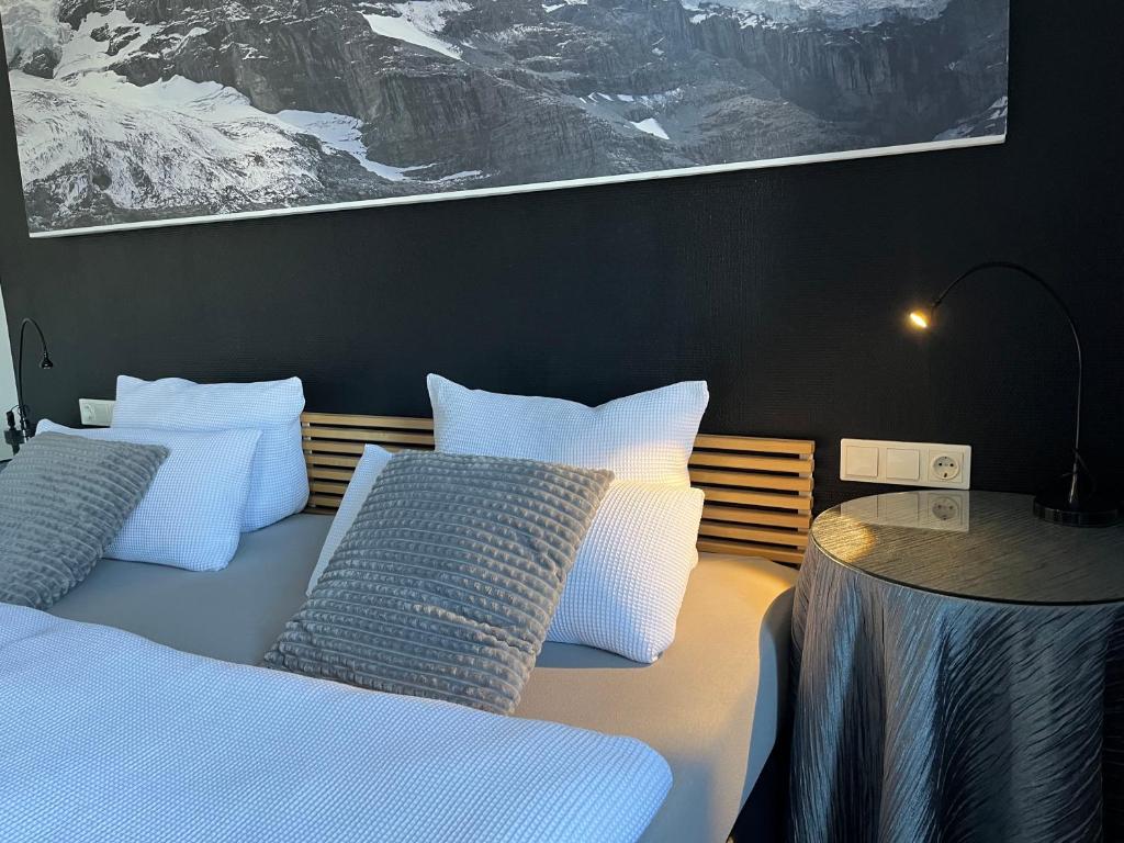Postel nebo postele na pokoji v ubytování Rein Klassik Hotel