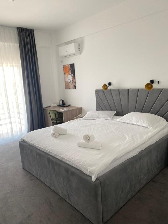 Postel nebo postele na pokoji v ubytování Hotel Maya