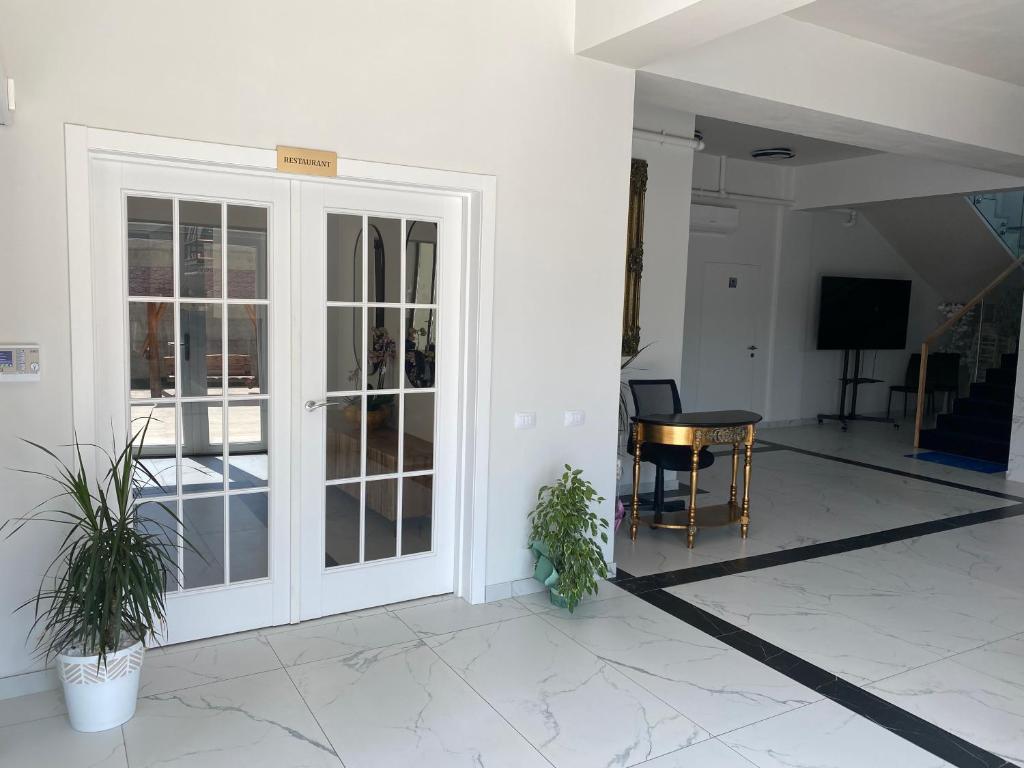 TV a/nebo společenská místnost v ubytování Hotel Maya