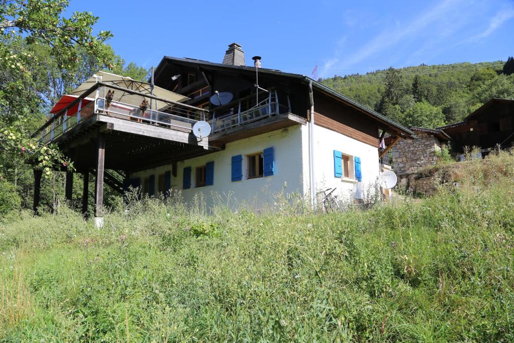 a house with a balcony on top of it at CHALET ELISTHUR in Saint-Jean-d&#39;Aulps