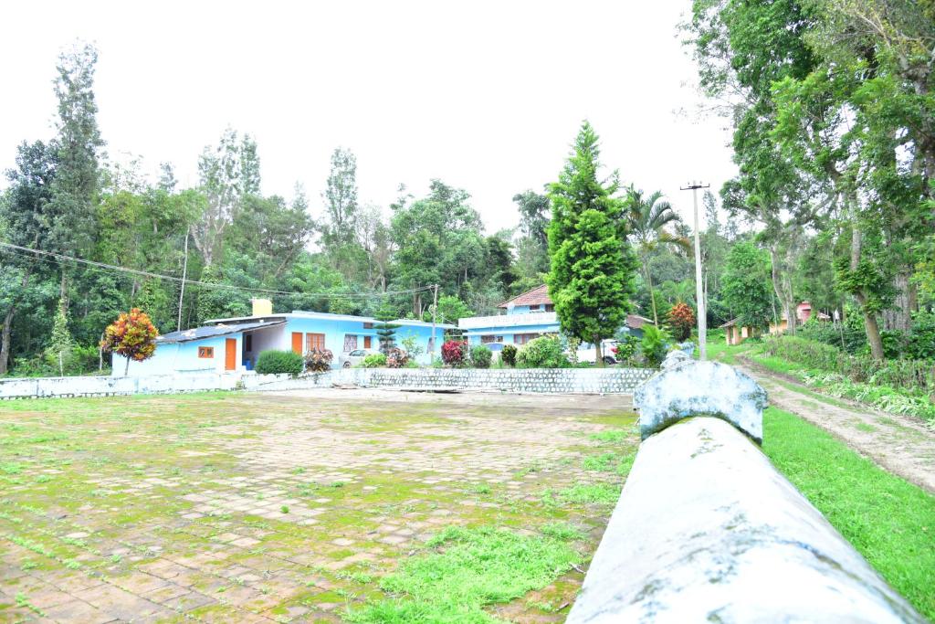 a view from the top of a fence of a house at Dharinidhama Homestay in SanivÄrsante