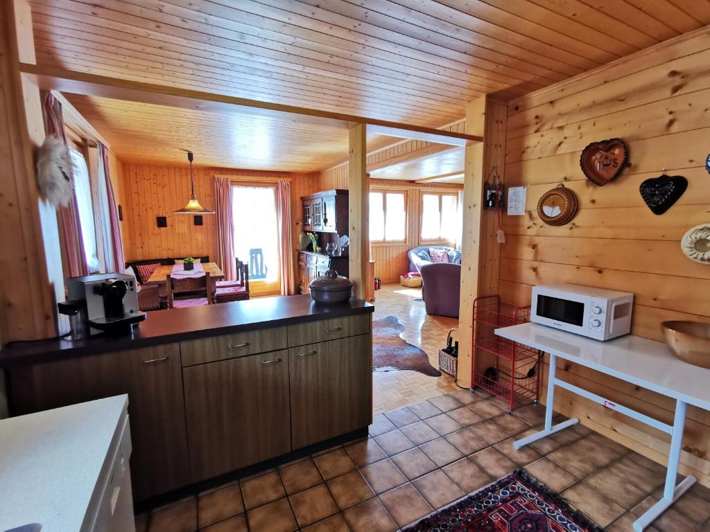 Posezení v ubytování CHALET HÜTTLE - authentisch, ruhig, mitten im grün