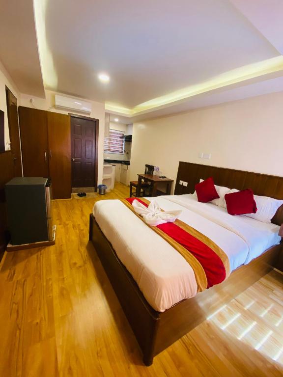 Postel nebo postele na pokoji v ubytování Hotel Abi International