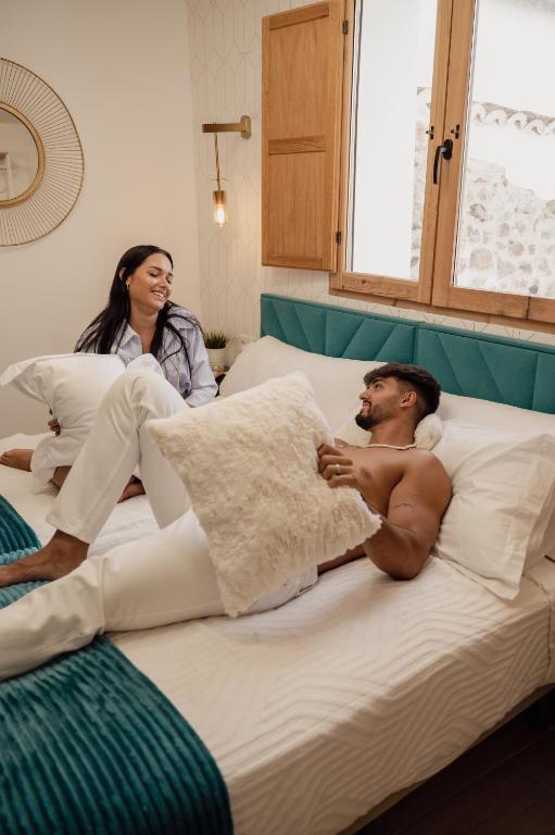 Posteľ alebo postele v izbe v ubytovaní El Edén Casas Rurales con Piscina y Jacuzzi