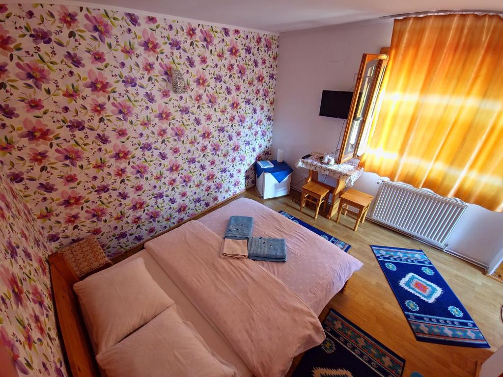 Ένα ή περισσότερα κρεβάτια σε δωμάτιο στο Casa Lav