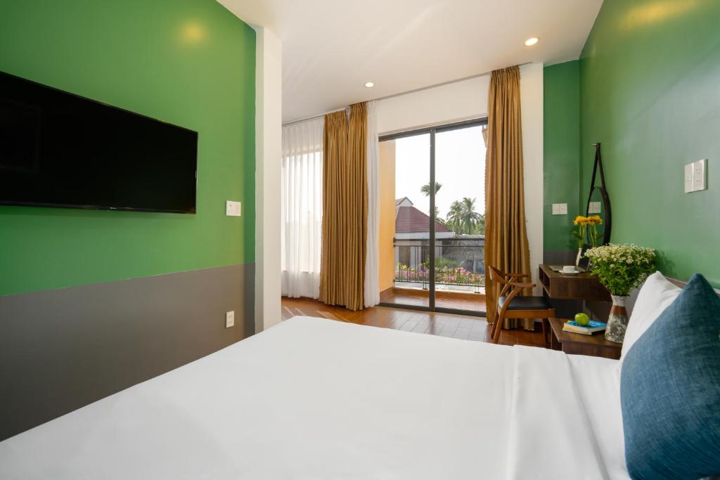Lancelynk Retreat Hoi An - 阳台的王室