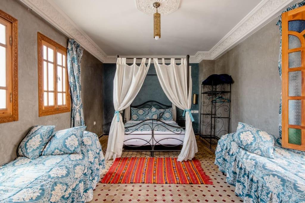 Voodi või voodid majutusasutuse Riad Dar Saidi toas