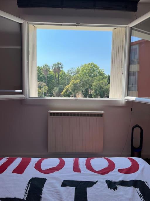 Postel nebo postele na pokoji v ubytování Les Cigales