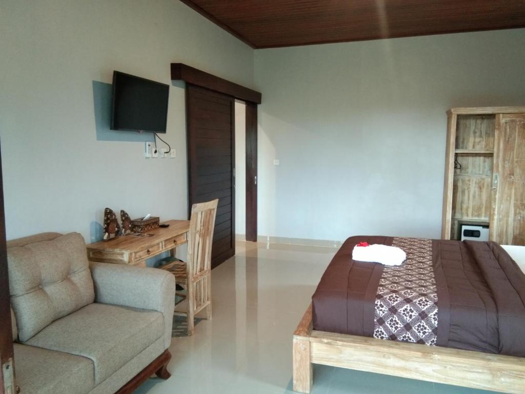 TV a/nebo společenská místnost v ubytování Merta Ubud Homestay