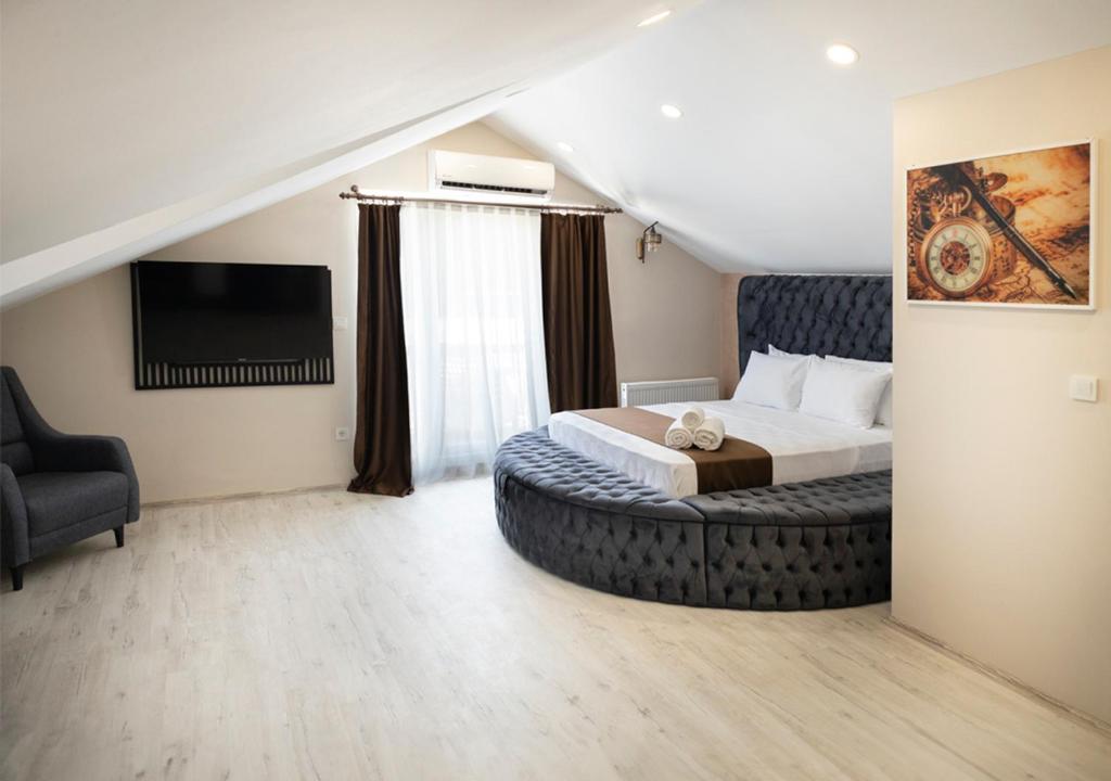 Katil atau katil-katil dalam bilik di Monezza Hotel Maltepe