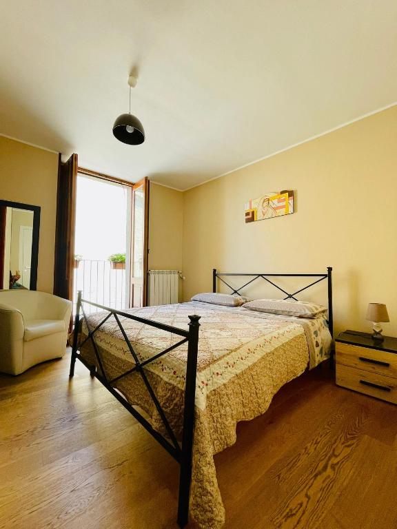 Łóżko lub łóżka w pokoju w obiekcie San Nicolò Holiday Home