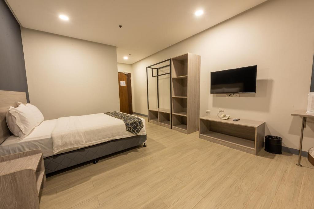 TV a/nebo společenská místnost v ubytování Hotel One