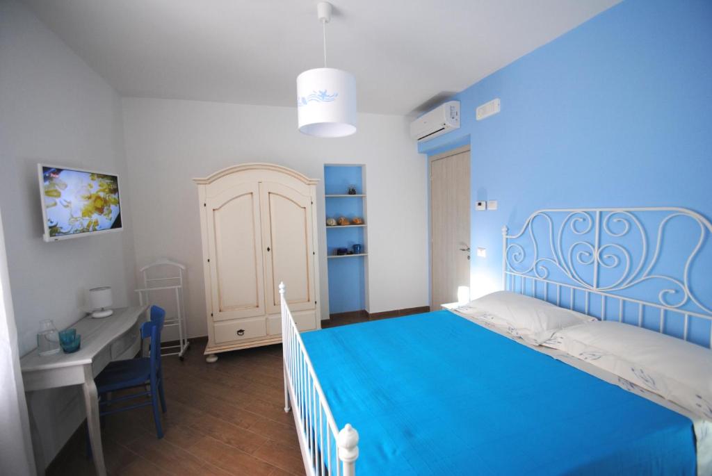 Postel nebo postele na pokoji v ubytování B&B Puglia Vista Mare