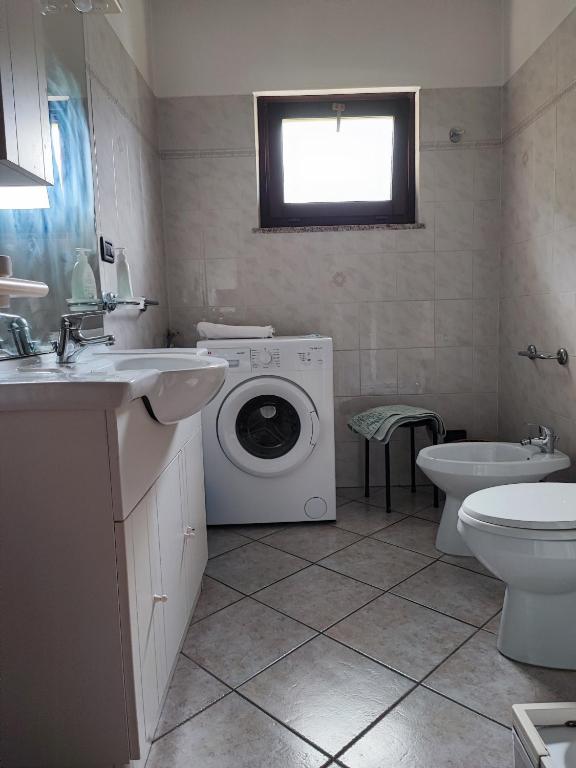 Koupelna v ubytování Casa vacanze a Macra