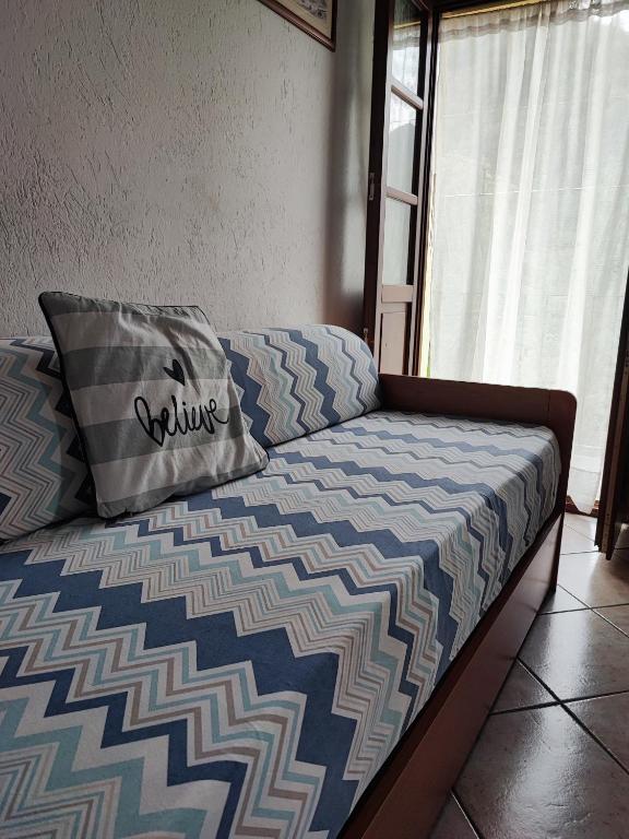 Postel nebo postele na pokoji v ubytování Casa vacanze a Macra