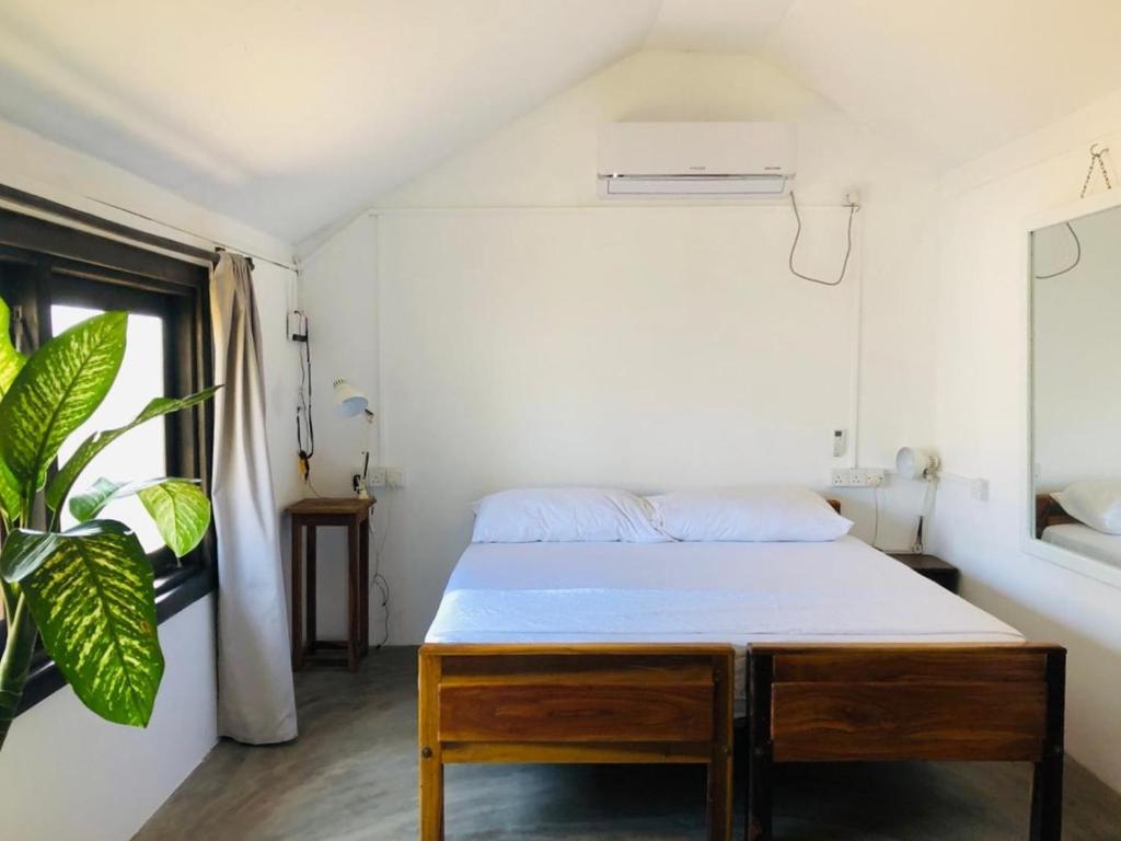 Postel nebo postele na pokoji v ubytování Azeer's