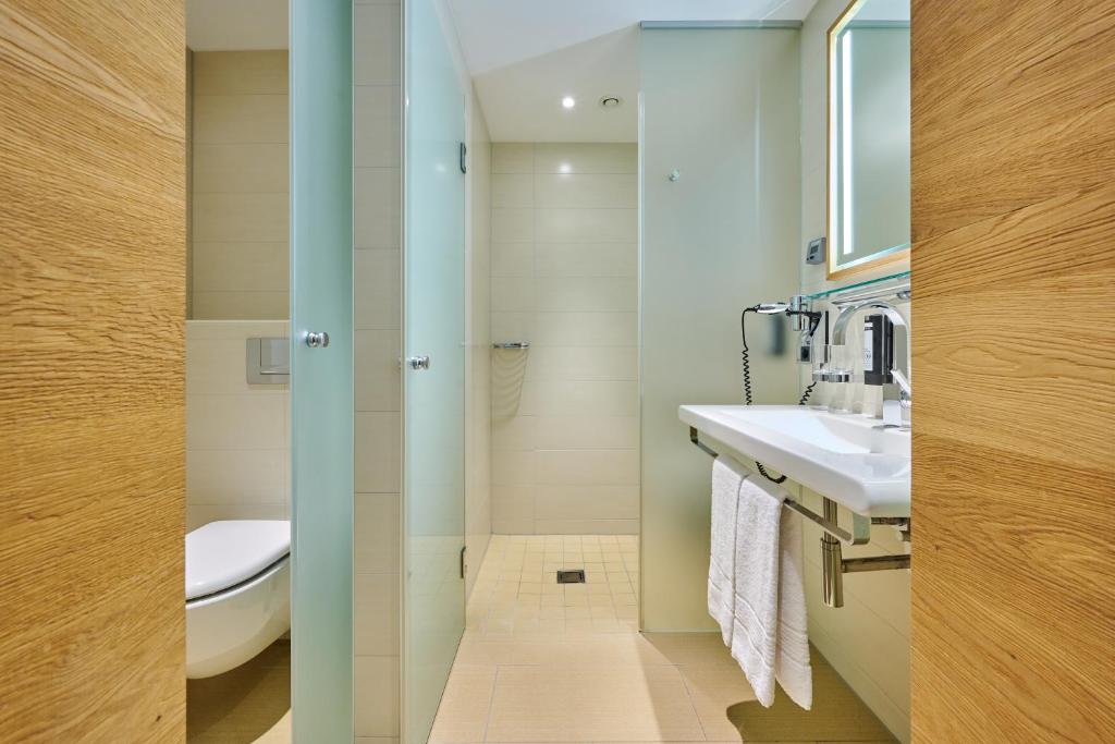 Koupelna v ubytování Asam Hotel