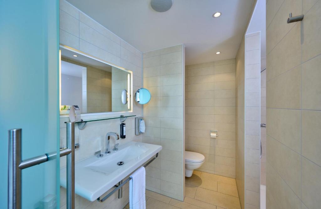 Koupelna v ubytování Asam Hotel