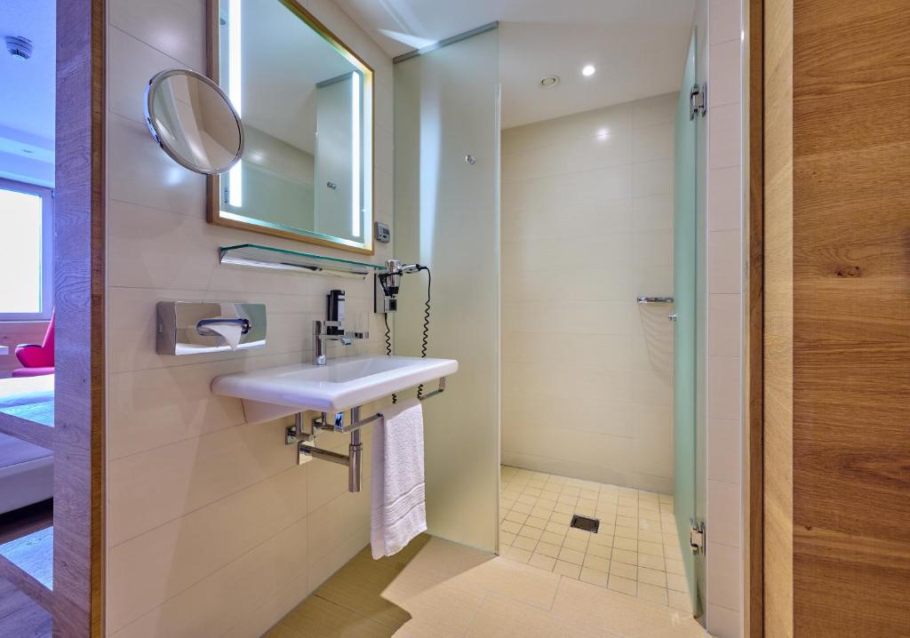 Koupelna v ubytování Asam Hotel