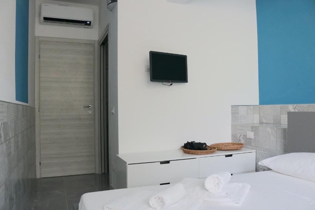 TV a/nebo společenská místnost v ubytování Gambara GuestS House