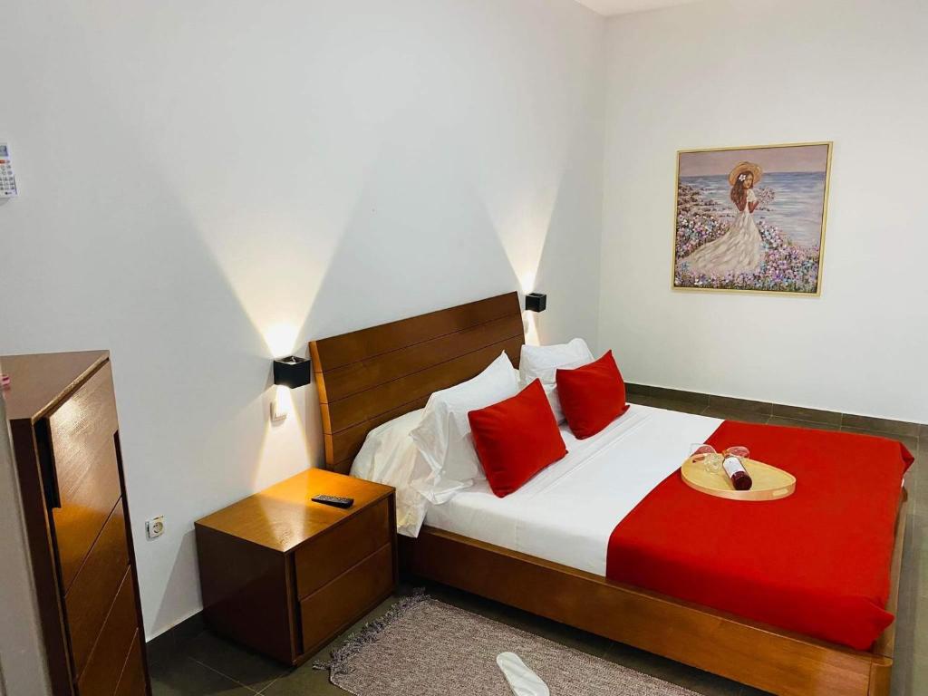 Postel nebo postele na pokoji v ubytování Fogo Boutique Hotel