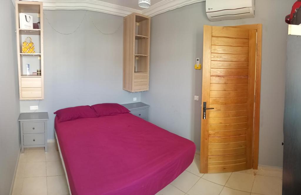 Postel nebo postele na pokoji v ubytování Appartement bien équipé à 5 min de la plage, TOUT INCLU!