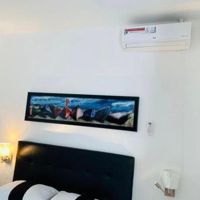 Postel nebo postele na pokoji v ubytování Fogo Boutique Hotel