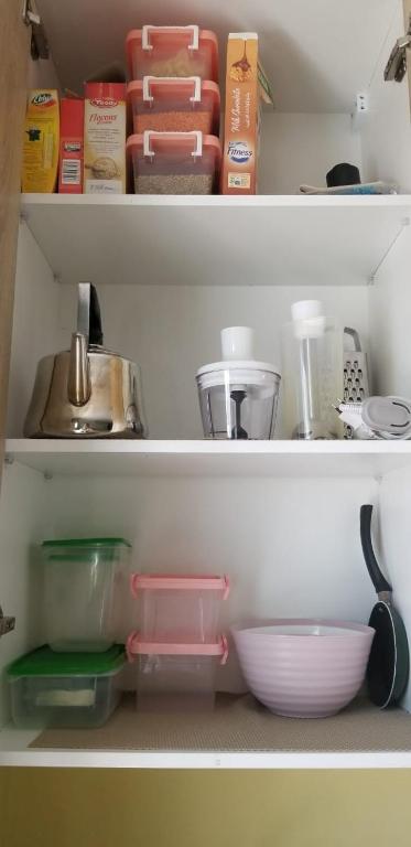 Kuchyň nebo kuchyňský kout v ubytování Appartement bien équipé à 5 min de la plage, TOUT INCLU!