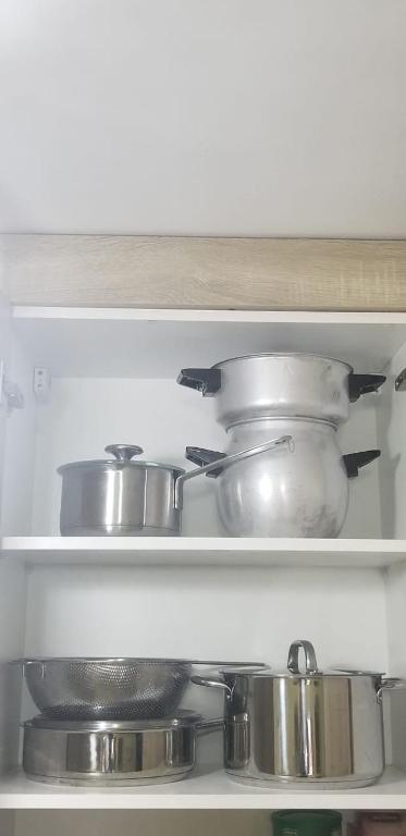 Kuchyň nebo kuchyňský kout v ubytování Appartement bien équipé à 5 min de la plage, TOUT INCLU!