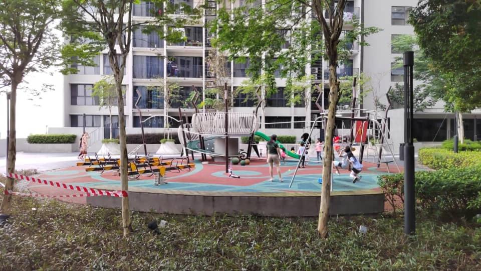 a park with children playing in a playground at Geo Condo Homestay Kota Kemuning Bukit Rimau in Shah Alam